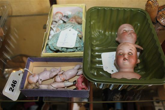 Two miniature bisque dolls (both a.f), 2 jointed baby dolls, 2 Heubach bisque heads, 4 porcelain shoulder doll heads etc